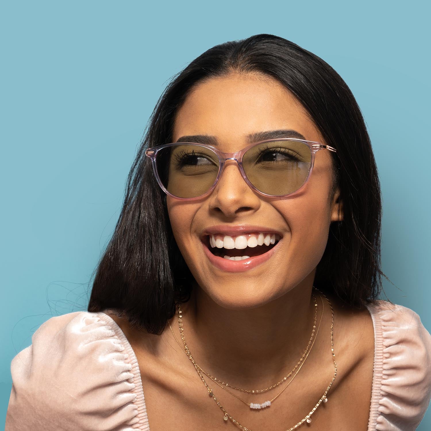 woman wearing axon optics lark migraine glasses headshot