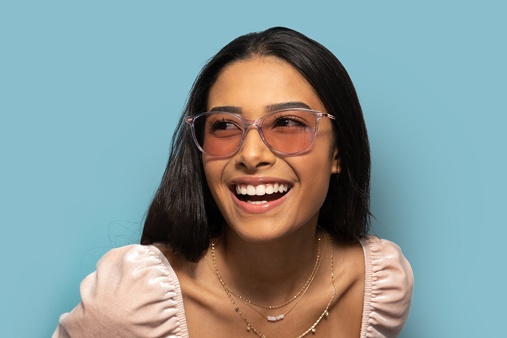 woman wearing lark migraine glasses